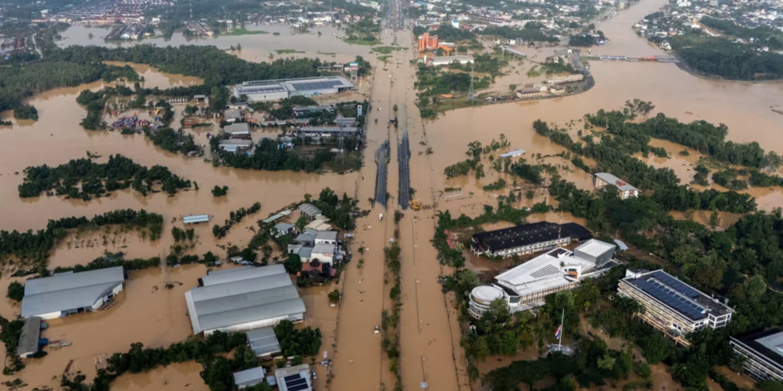Severe flooding in Southeast Asia with submerged homes and displaced families